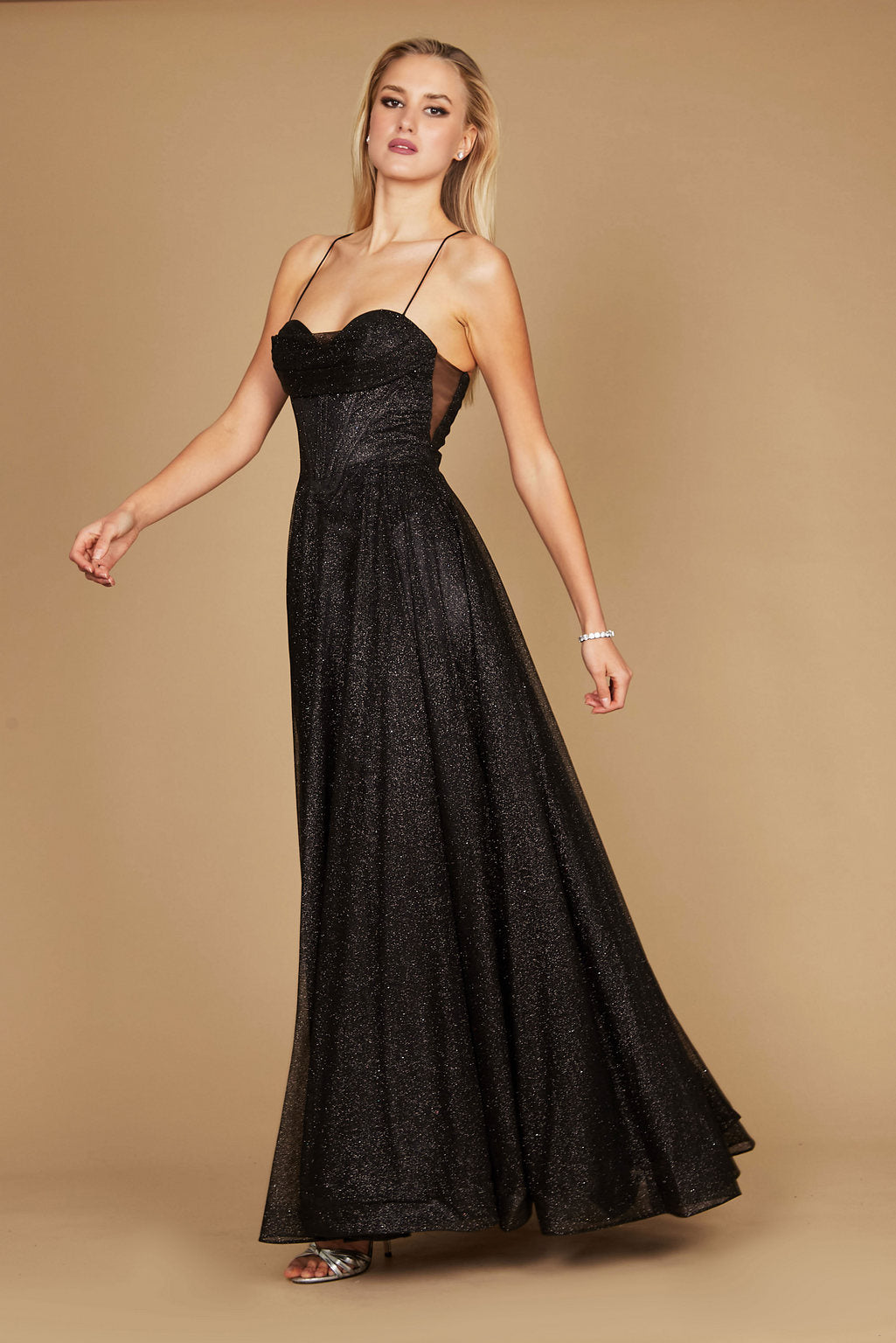 A stunning black prom dress featuring a long, sparkling cowl neckline and a fitted corset bodice, elegantly flowing into a full skirt that shimmers with every movement.