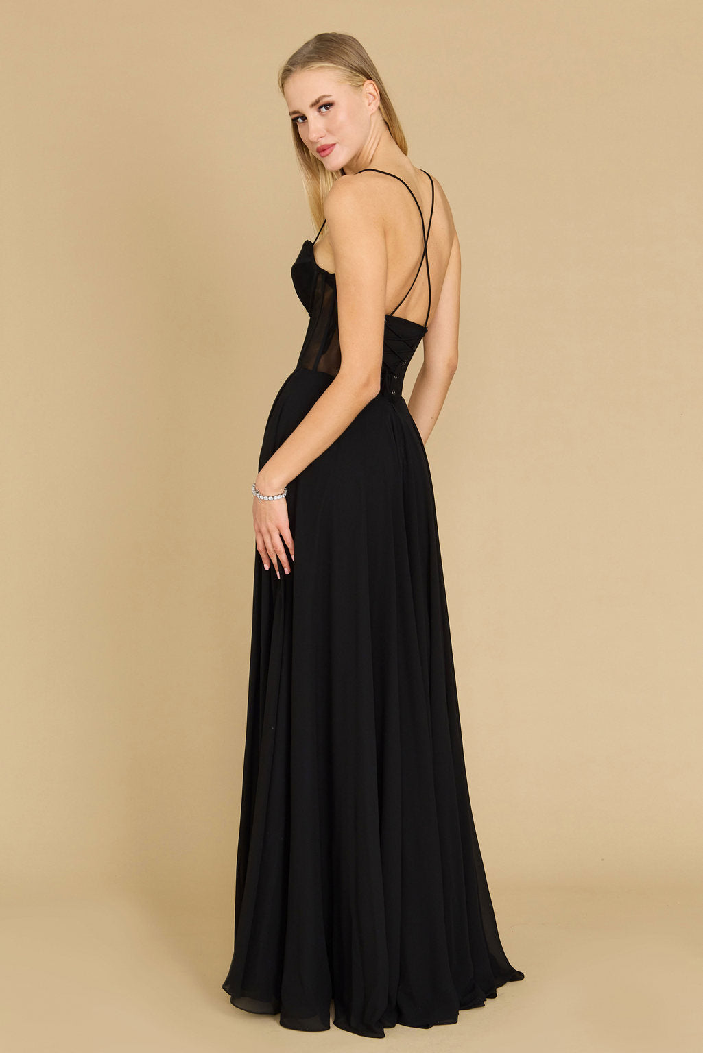 Elegant long chiffon corset formal prom dress in black, featuring a fitted bodice and flowing skirt, perfect for a sophisticated evening look.