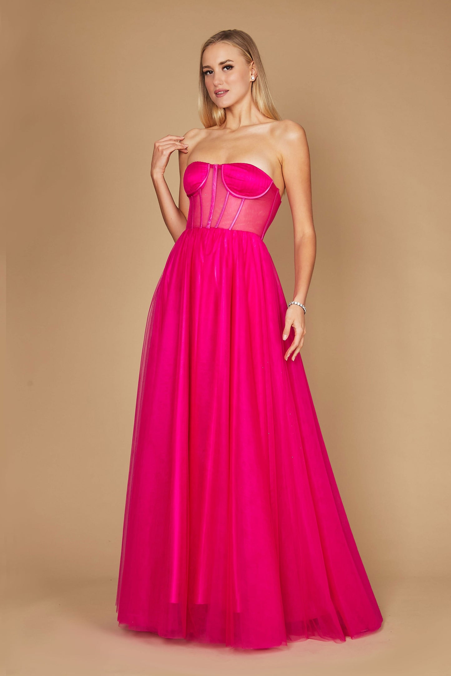 A stunning fuchsia corset prom party dress featuring intricate detailing, designed for formal occasions, with a flowing ball gown silhouette that exudes elegance and sophistication.