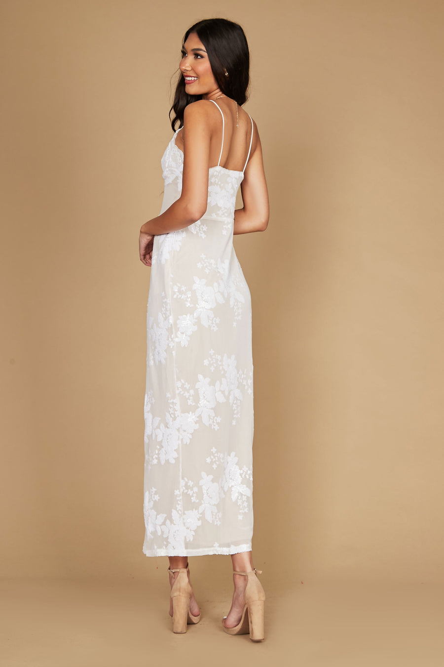 A stylish long spaghetti strap cocktail dress in a rich hue, featuring a fitted bodice and flowing skirt, perfect for formal occasions.