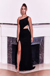 A stunning black prom dress featuring elegant side cutouts, designed to accentuate the figure with a sleek silhouette and sophisticated style.