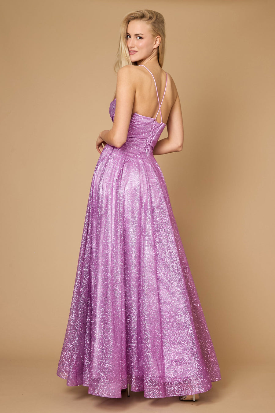 A stunning mauve prom dress featuring a long, sparkling cowl neckline and a fitted corset bodice, elegantly flowing into a full skirt that shimmers with every movement.