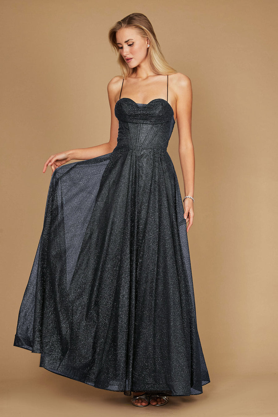 A stunning long charcoal prom dress featuring a sparkling cowl neckline and a fitted corset bodice, elegantly flowing into a full skirt.