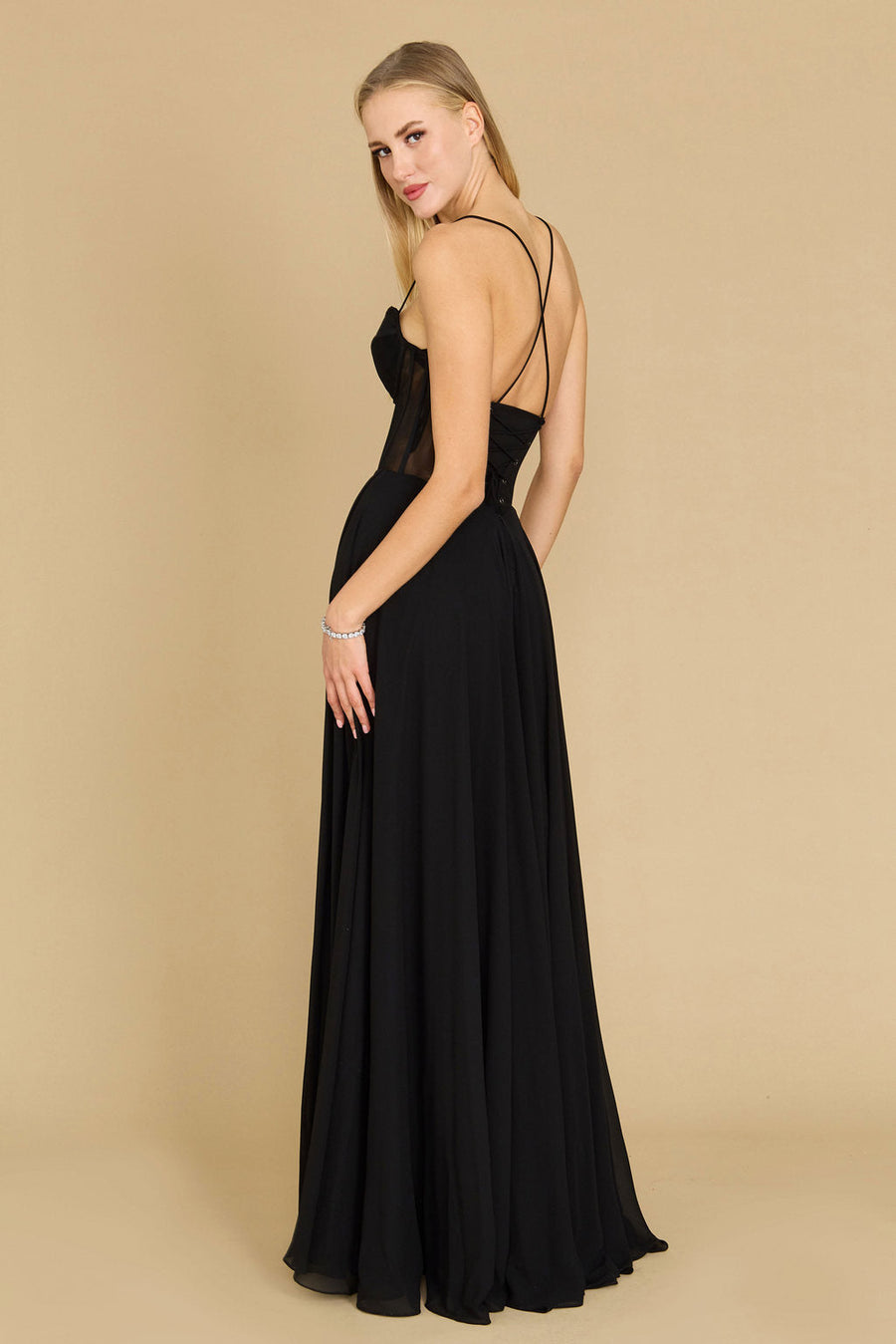 Elegant long chiffon corset formal prom dress in black, featuring a fitted bodice and flowing skirt, perfect for a sophisticated evening look.